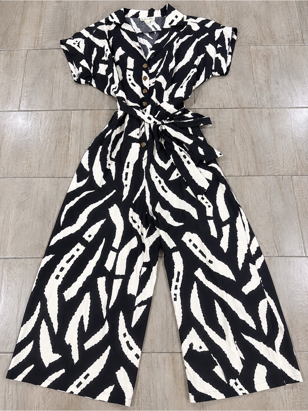 Indigo Rose Black White Printed Button Front Tie Waist Jumpsuit